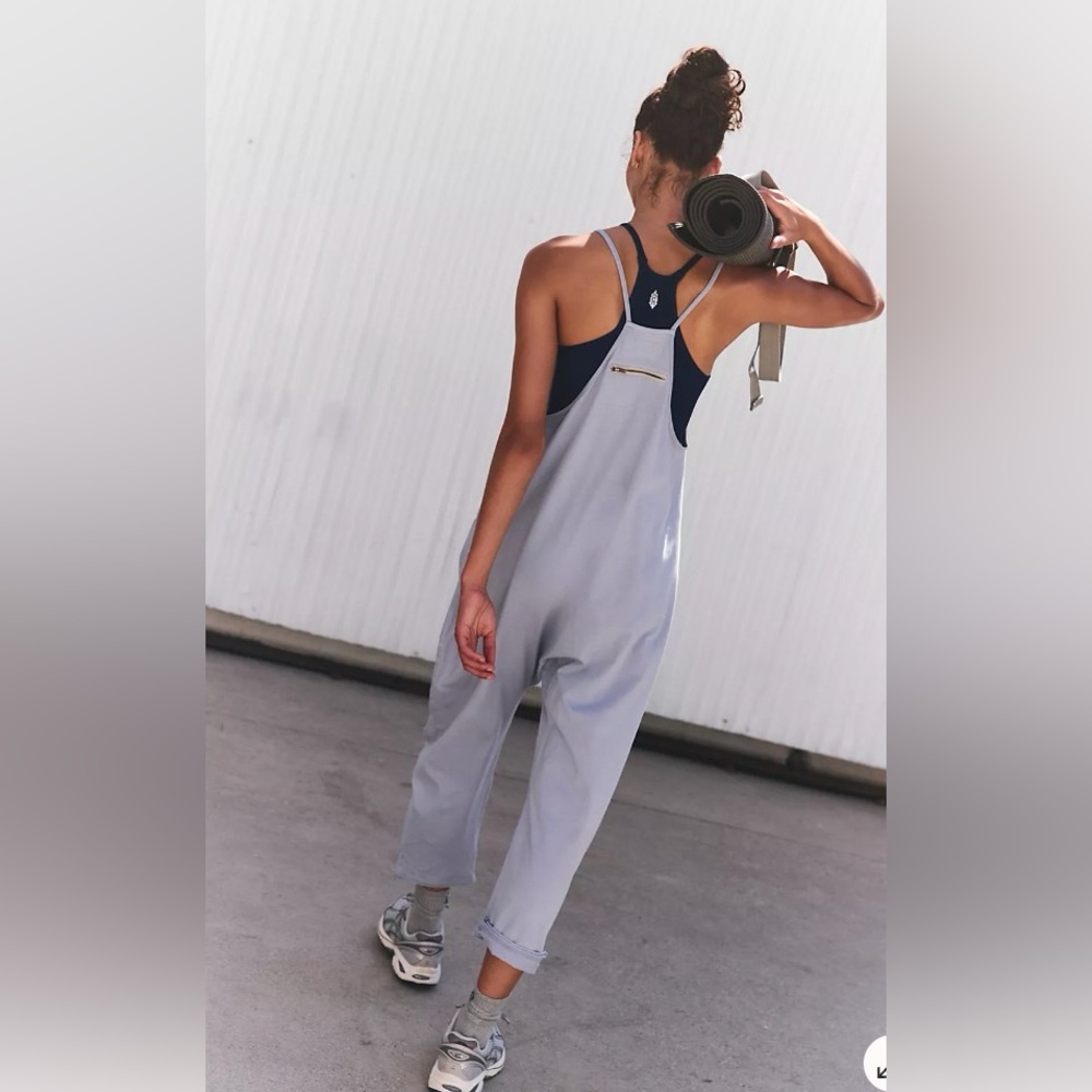 Soft/comfy onesie features slouchy, relaxed-fit  w dropped crotch & pockets.